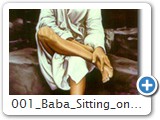 001 baba sitting on stone
